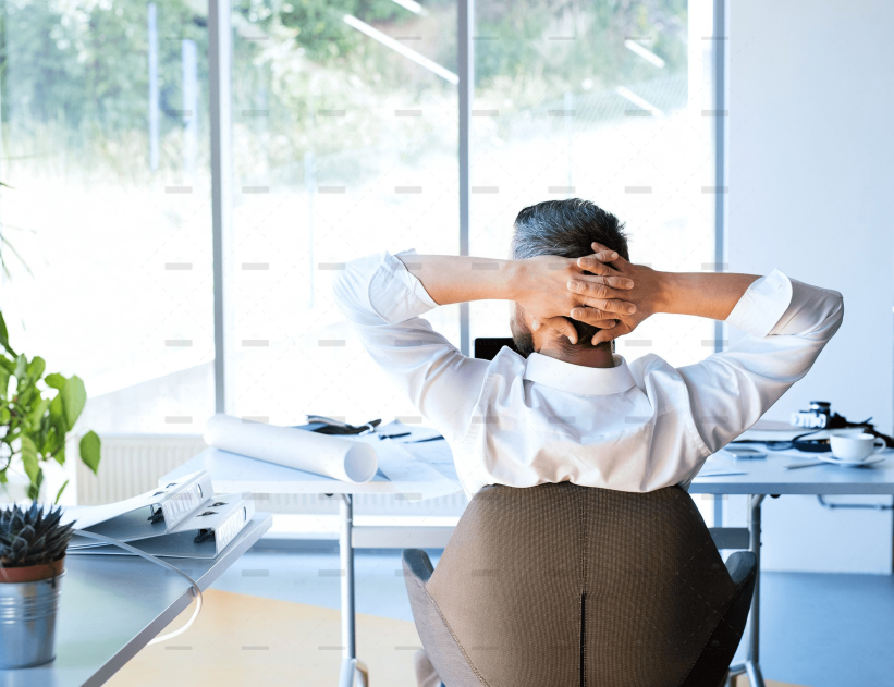 demo-attachment-477-Businessman-at-the-desk-in-his-office-resting.